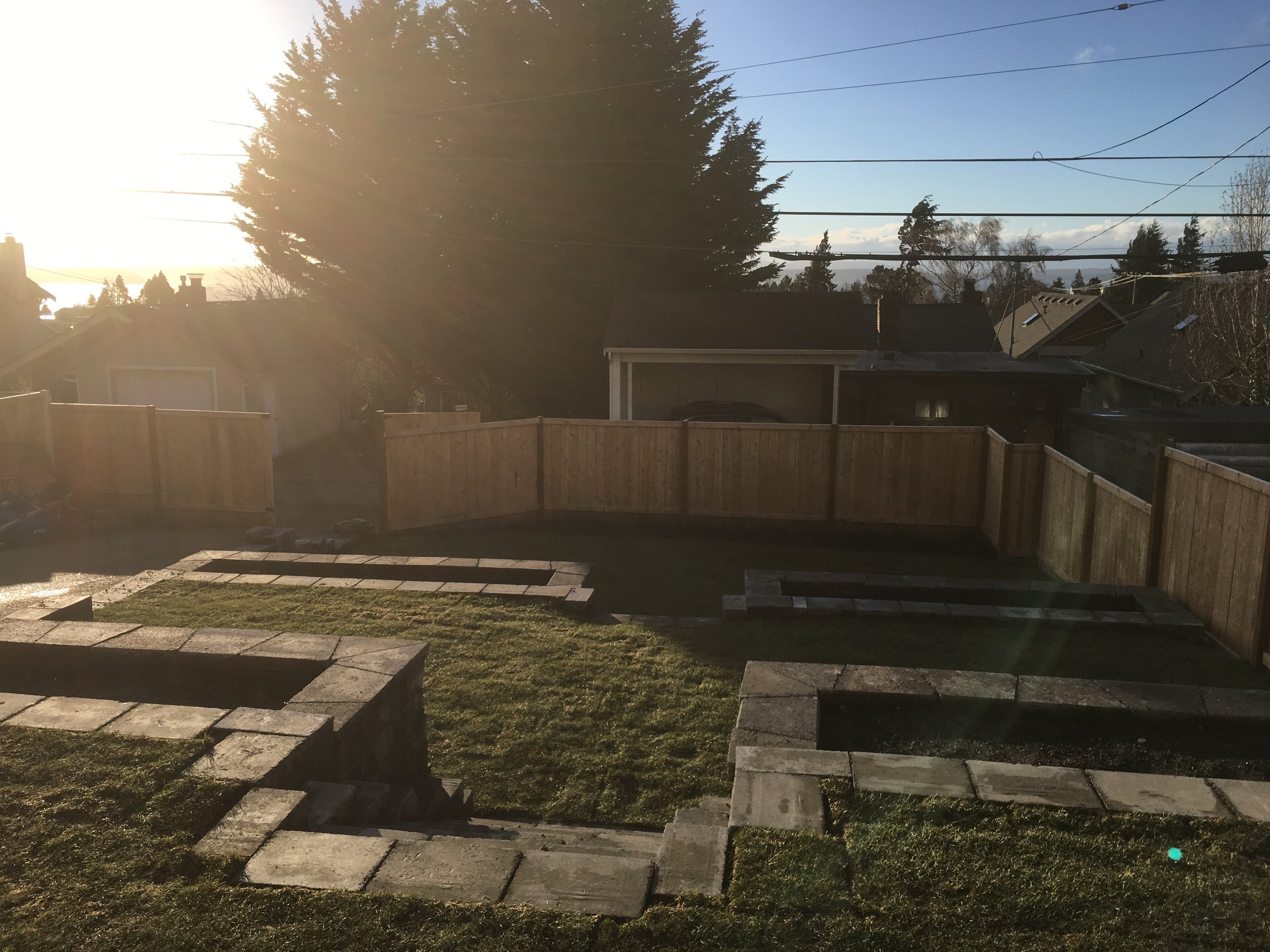 View from top down. His new fence with a double gate for car entry