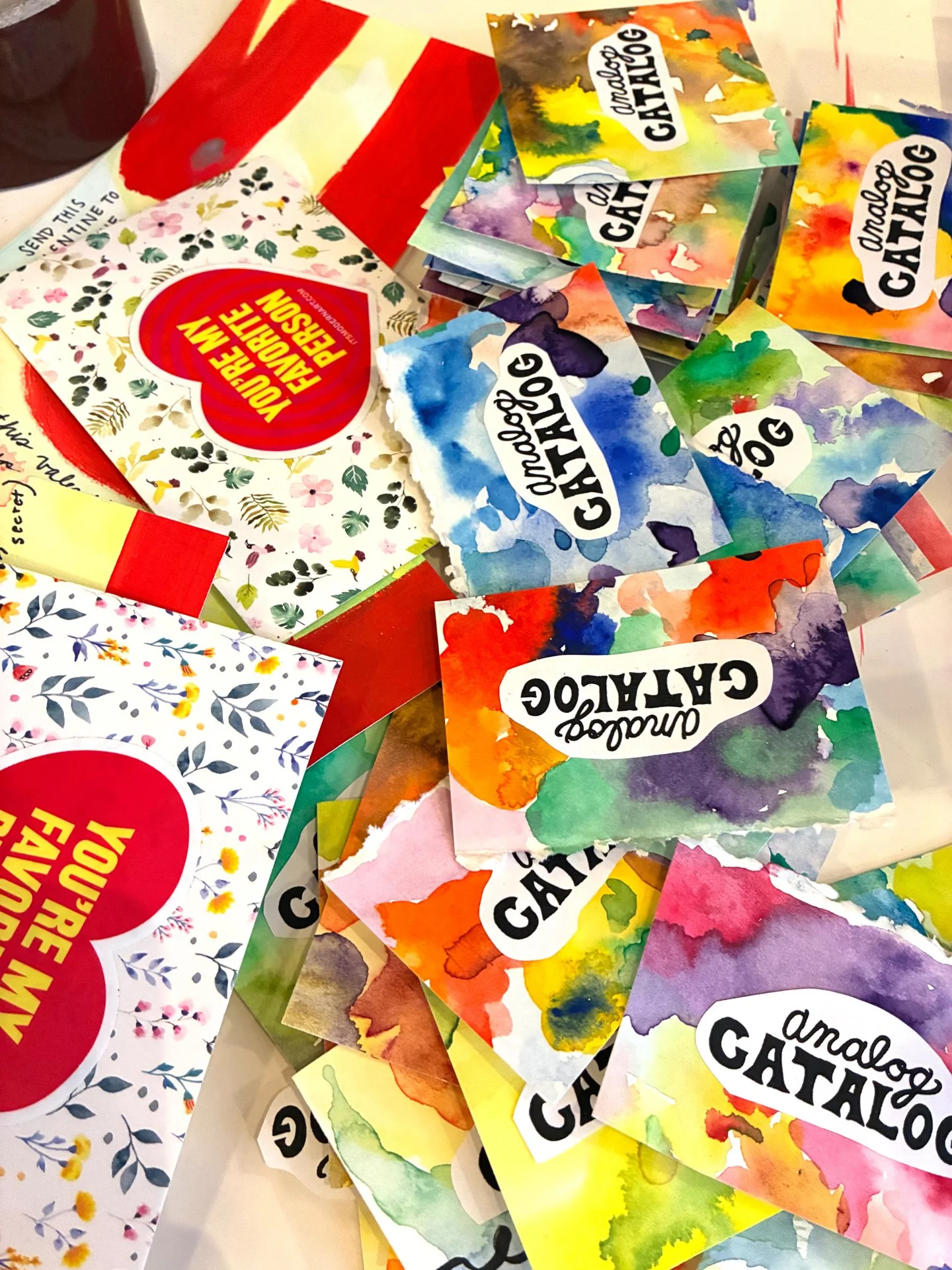 Hand-painted labels for the envelopes