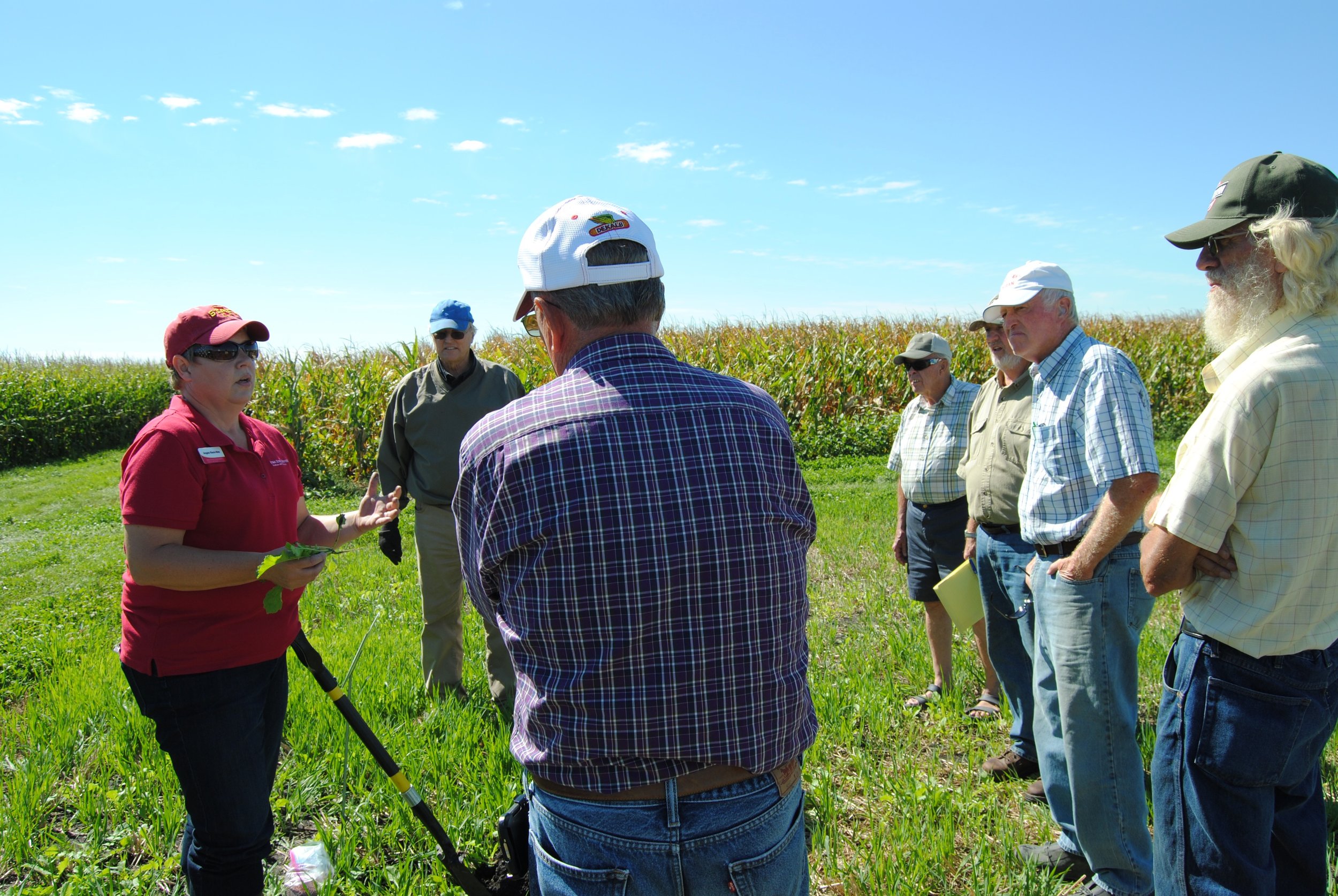 Photo caption: Angie Rieck-Hinz talks with farmers about the benefits of different types of cover crops at a field day at the Northern Research and Demonstration Farm.