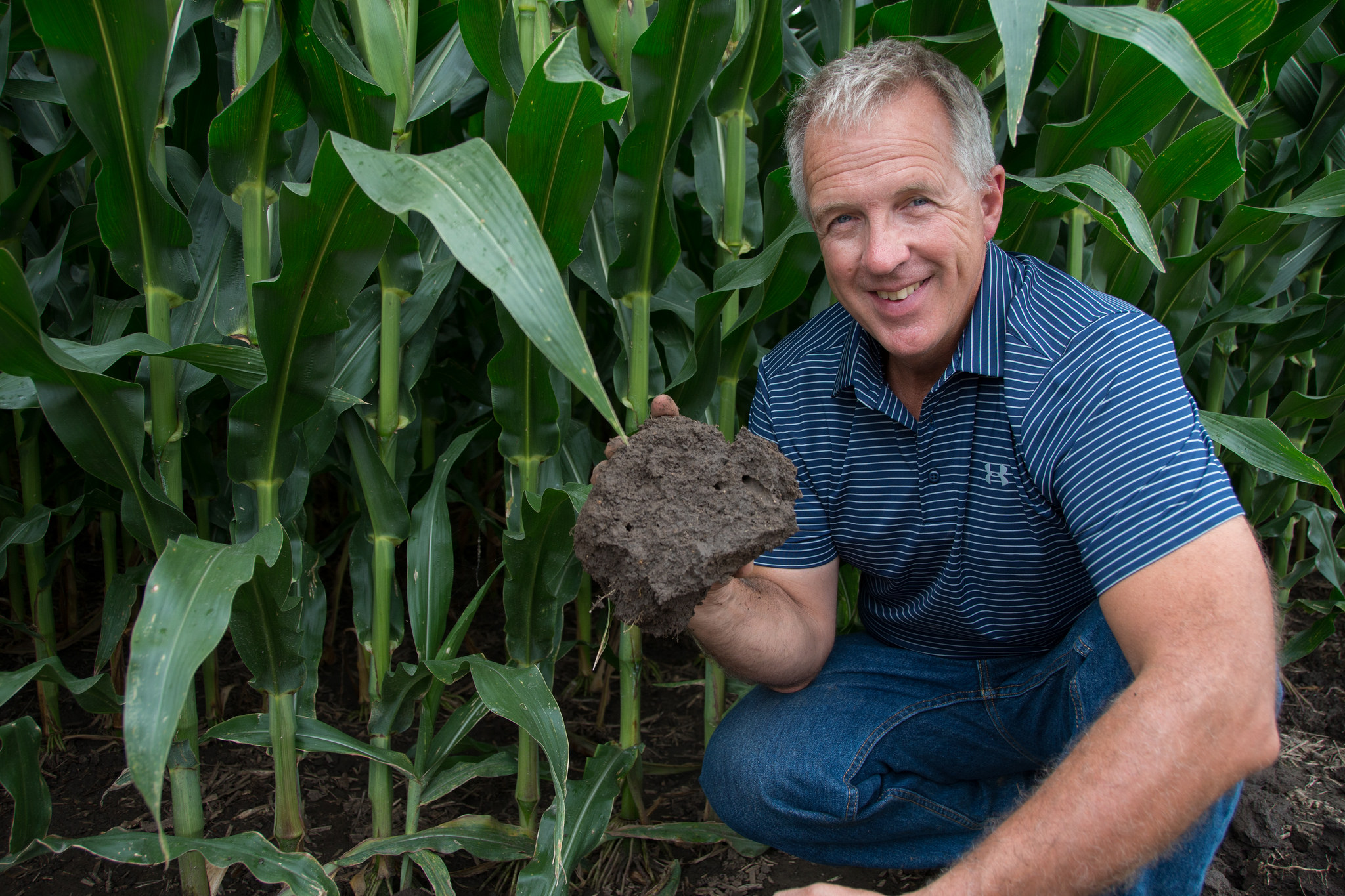 Steve Berger checking out the soil on his Wellman, Iowa farm