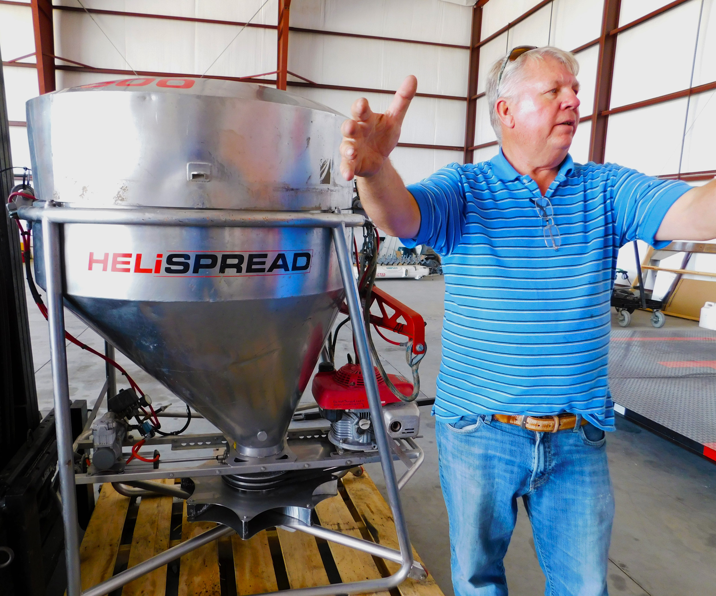   Johnson explain the value of his aerial seeder when it comes to cover crop application.  