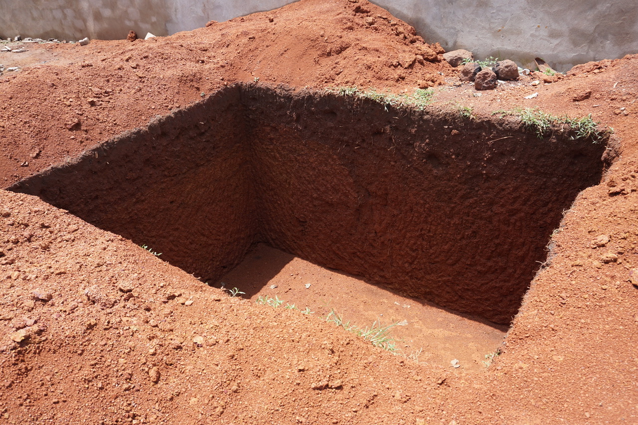 Septic tank is dug and ready to be built with blocks.