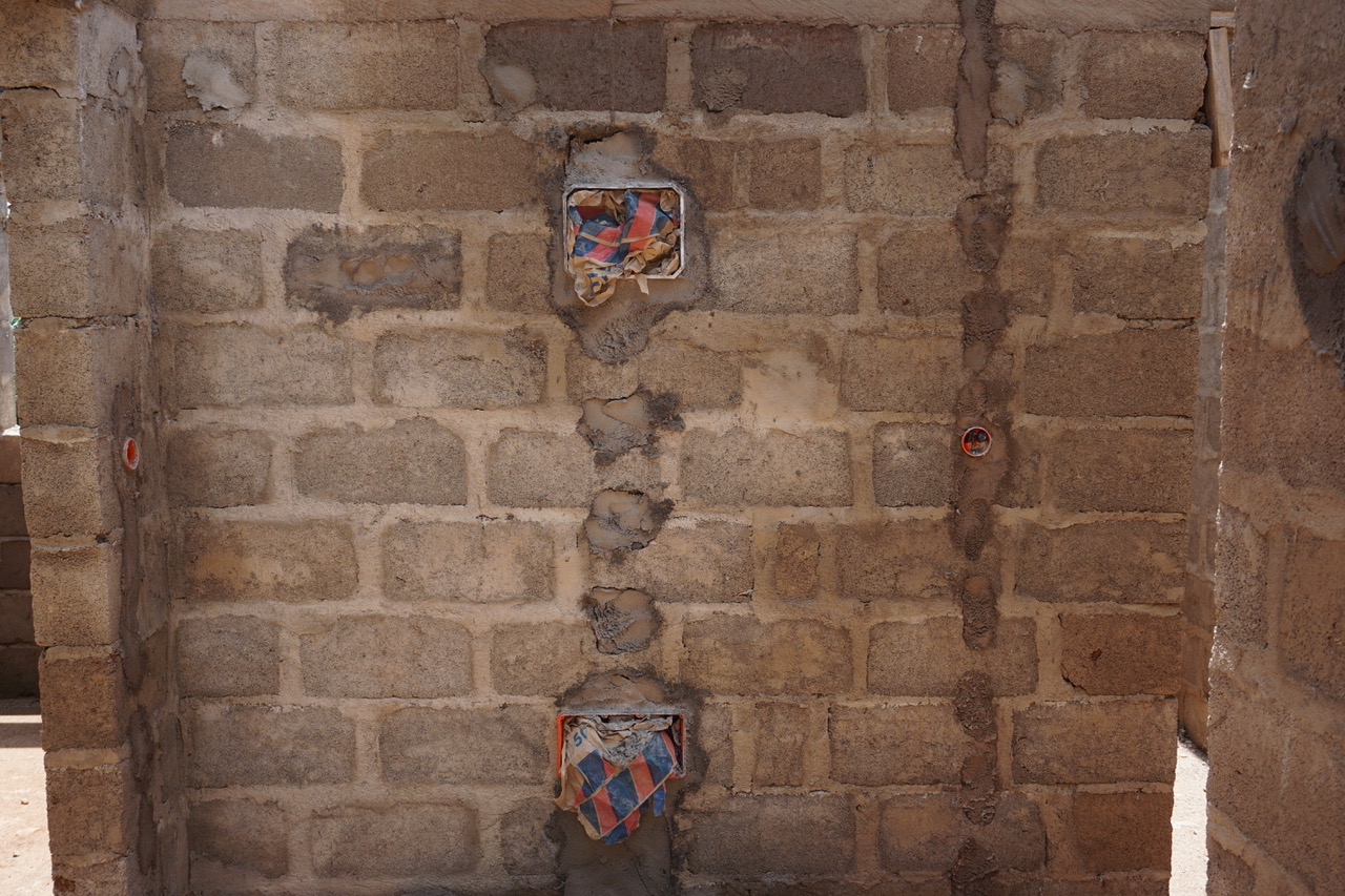 Electrical boxes and patched blocks (they chisel out the block to run the electrical). 