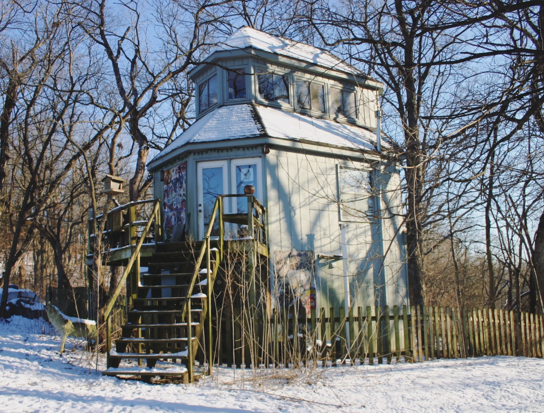 Exterior of the house of steps. I love how the fence around the house goes UNDER the entry stairs. Clever, house of steps, very clever. See rest of post for more elevations- she just gets more and more interesting. (Unless otherwise stated,&nbsp;all…
