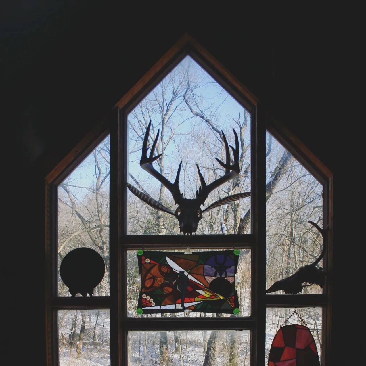 Part of the cathedral window in the bedroom space.&nbsp;