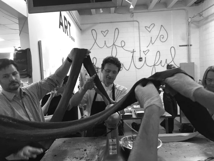 Cooking class participants making pasta at Al Volo.