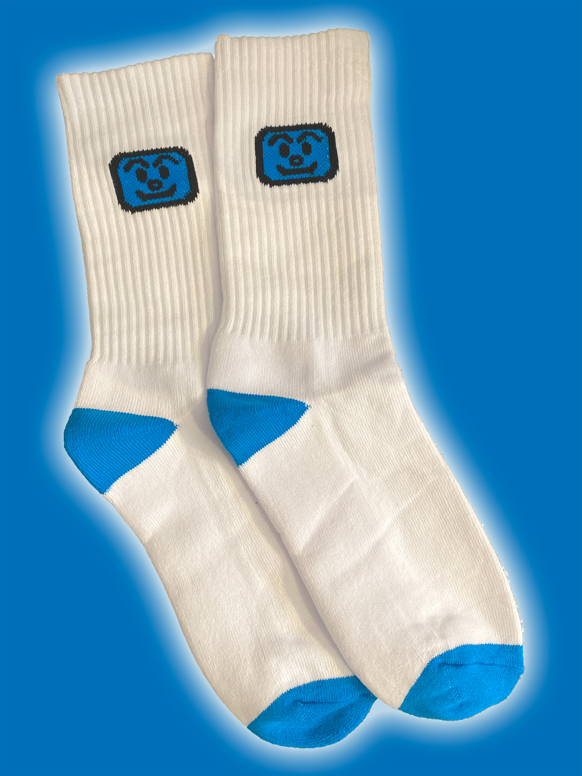 website-smiley-socks-blue-background.png