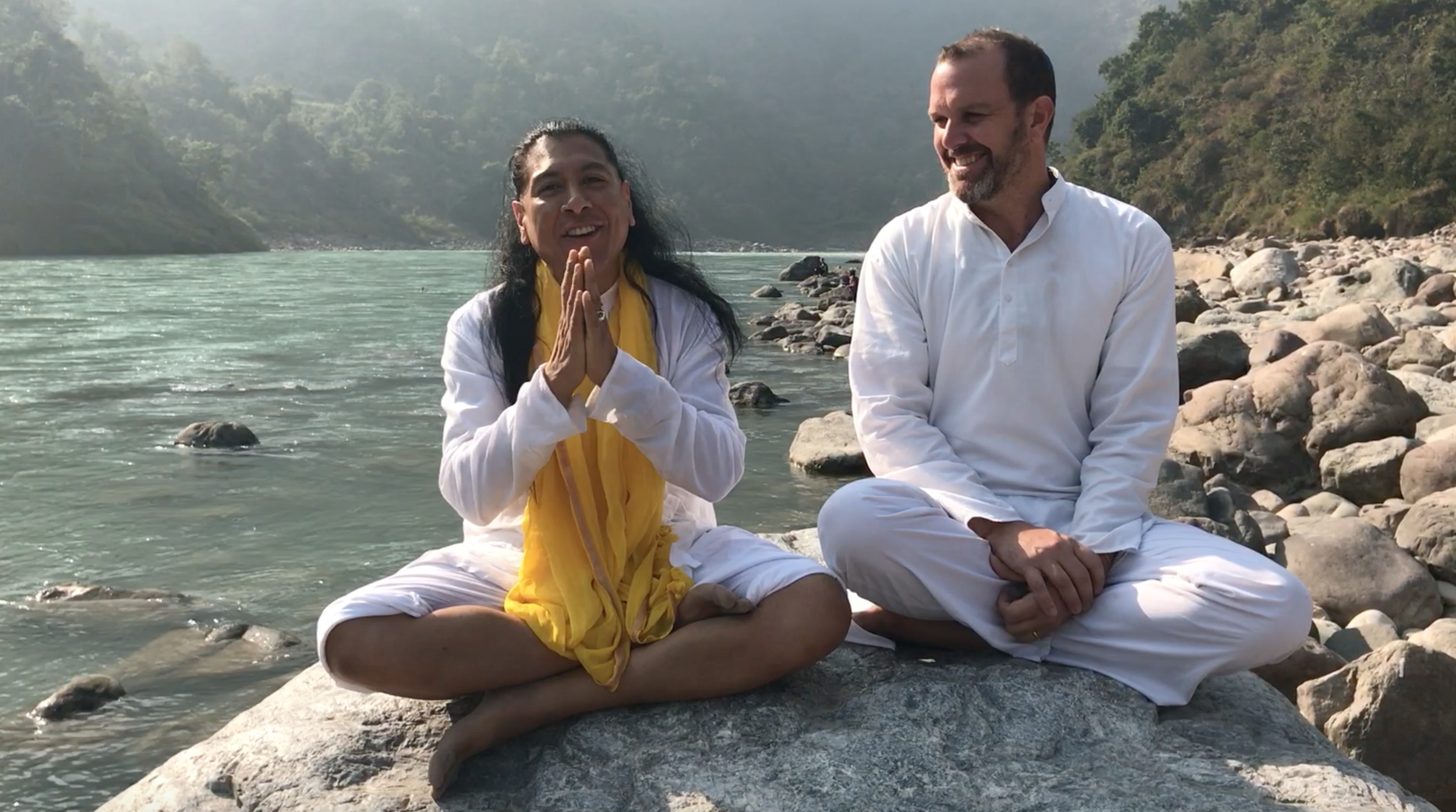 Teachers Don Jose Ruiz and Ramakrishna Ananda giving a satsang (teaching) on the banks of the Ganges in Rishikesh.