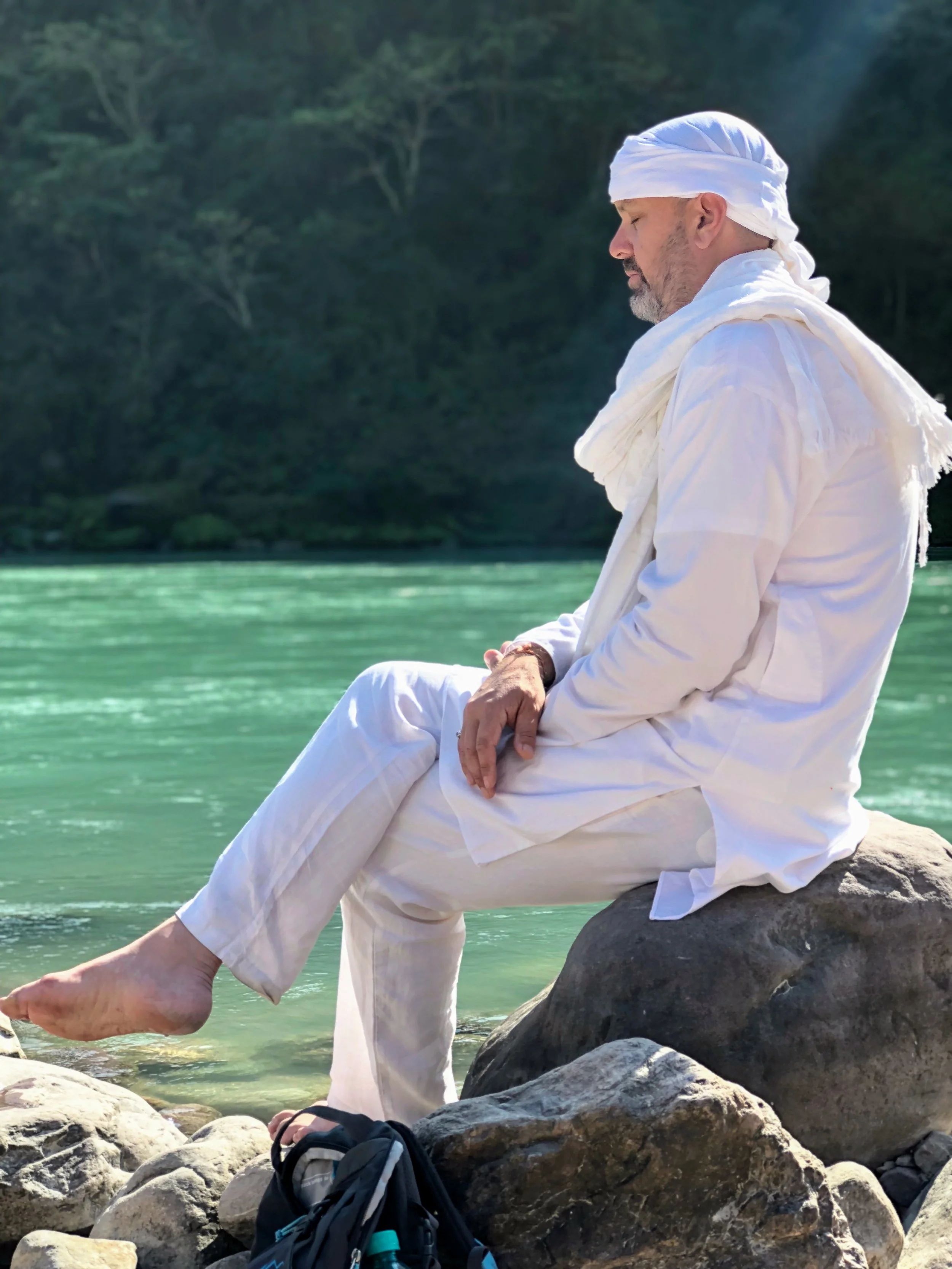 Ramakrishna before a water ceremony on the bank of the Ganges