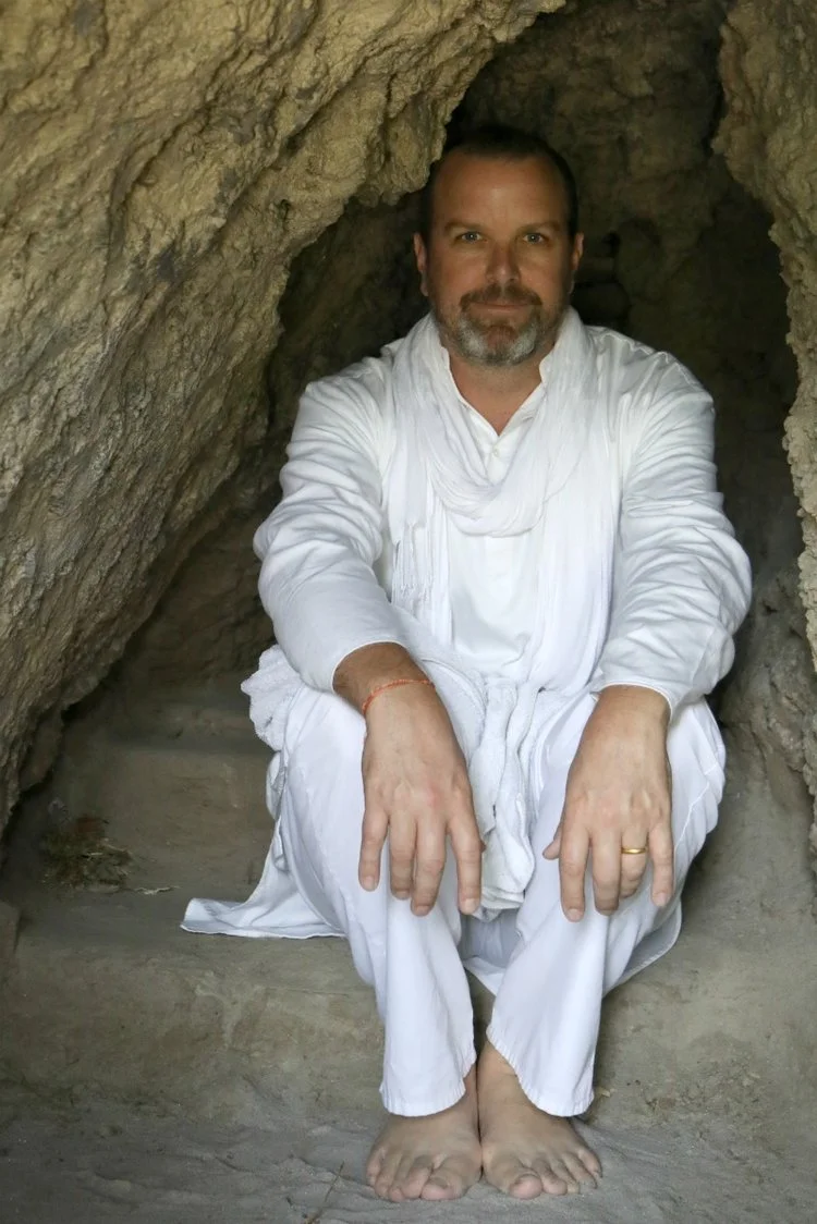Ramakrishna in caves along the Ganges river in Rishikesh.