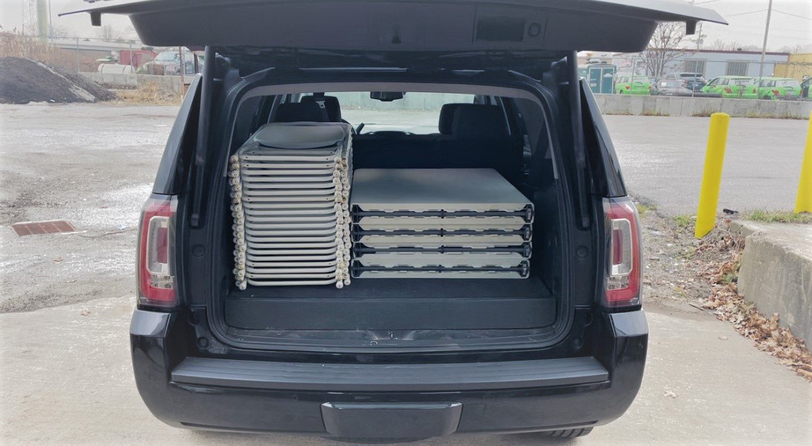 (20) Folding Chairs - (4) 6ft Tables in a SUV