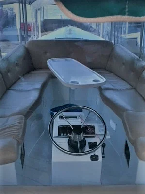 Interior of the regular sized boat. Blankets stored under seats.