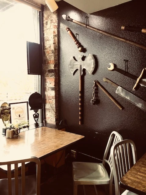 Medieval Weapons on the walls of Cheese Wizards / Photo Credit: Bella Stephens