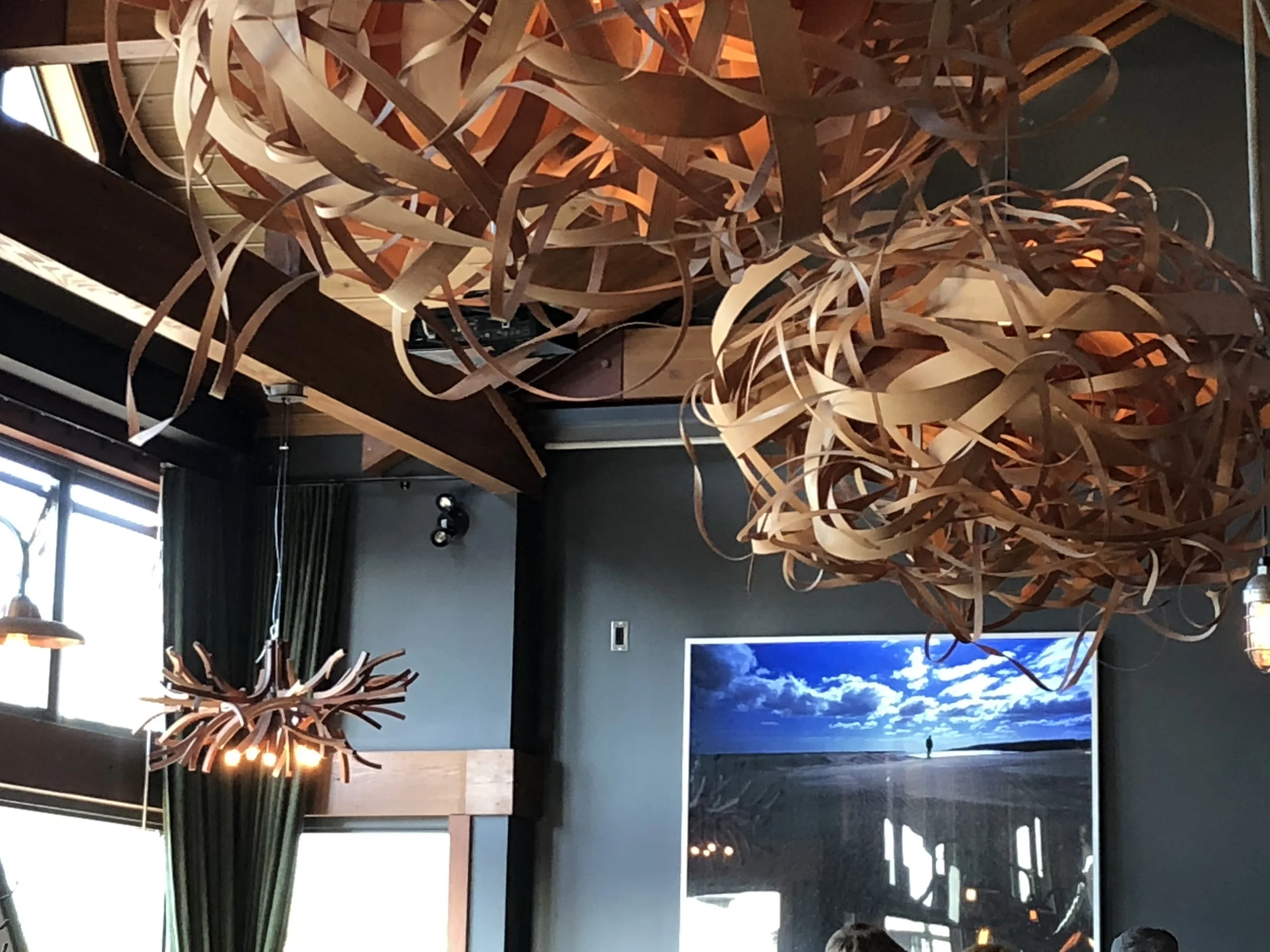 The upstairs dining room at Wolf In The Fog is warm and inviting and features whimsical wood sculptures. There is also a covered, outside patio. If on the rotating menu, try the cheese pierogis, house-made pasta and Salt Spring Island mussels.