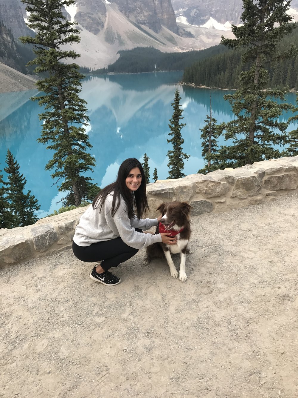 Erica, our Marketing Coordinator and her dog, Iggy at Moraine Lake.