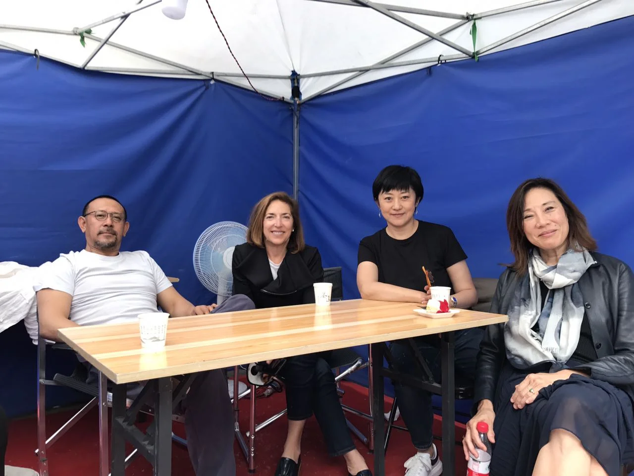 On the set with Jiang Wen
