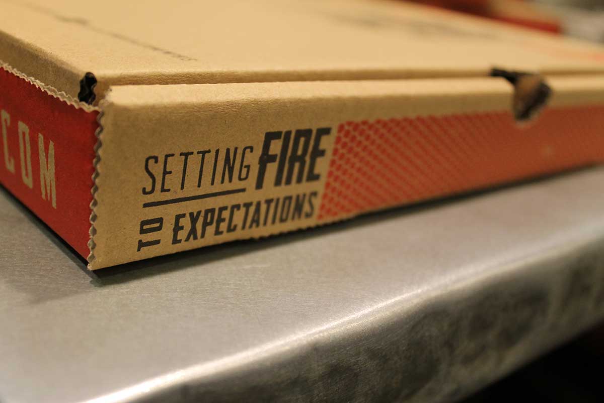 Pyros Fire Fresh Pizza Detail shot of pizza box. More photos and information on the Pyro's project page .