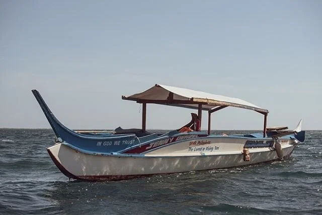 These guys are living and working on these boats. Ferrying tourists between the mainland and islands. Catching fish, selling and cooking them for the beach goers for fresh food. You&rsquo;ll catch them taking siestas and calling family all on the boa