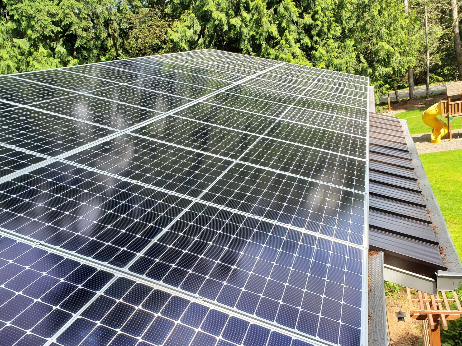 Rooftop solar array creates clean renewable energy.