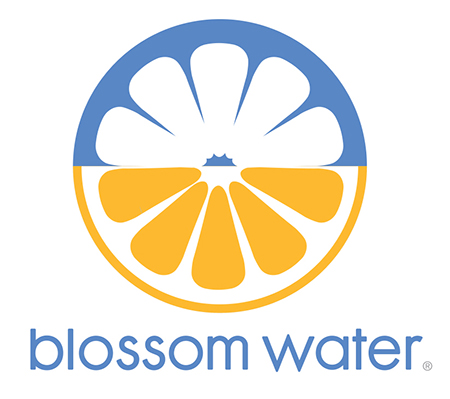  2 color logo combining image of a flower with the image of a fruit. 