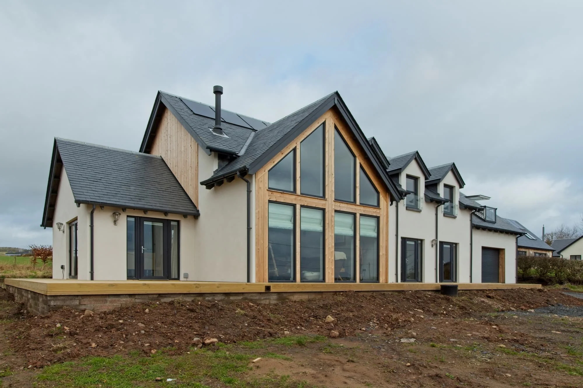 self-build-scotland-architect-modern-house-with-wood-cladding-and-cream-render.jpg