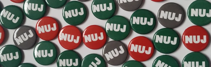 nuj badges.jpg