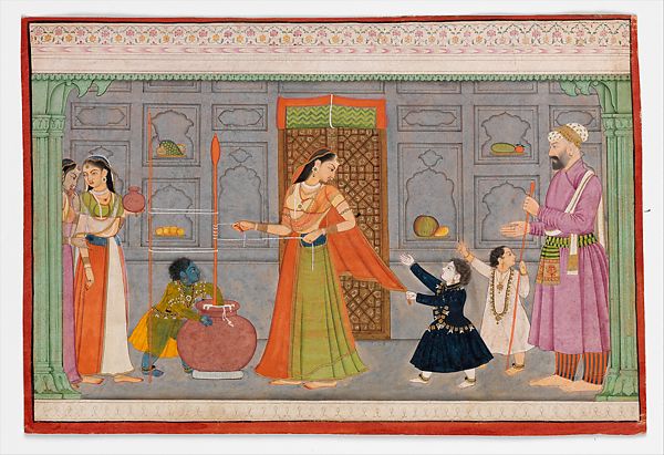 Child Krishna steals butter from a churn while the women aren’t looking.