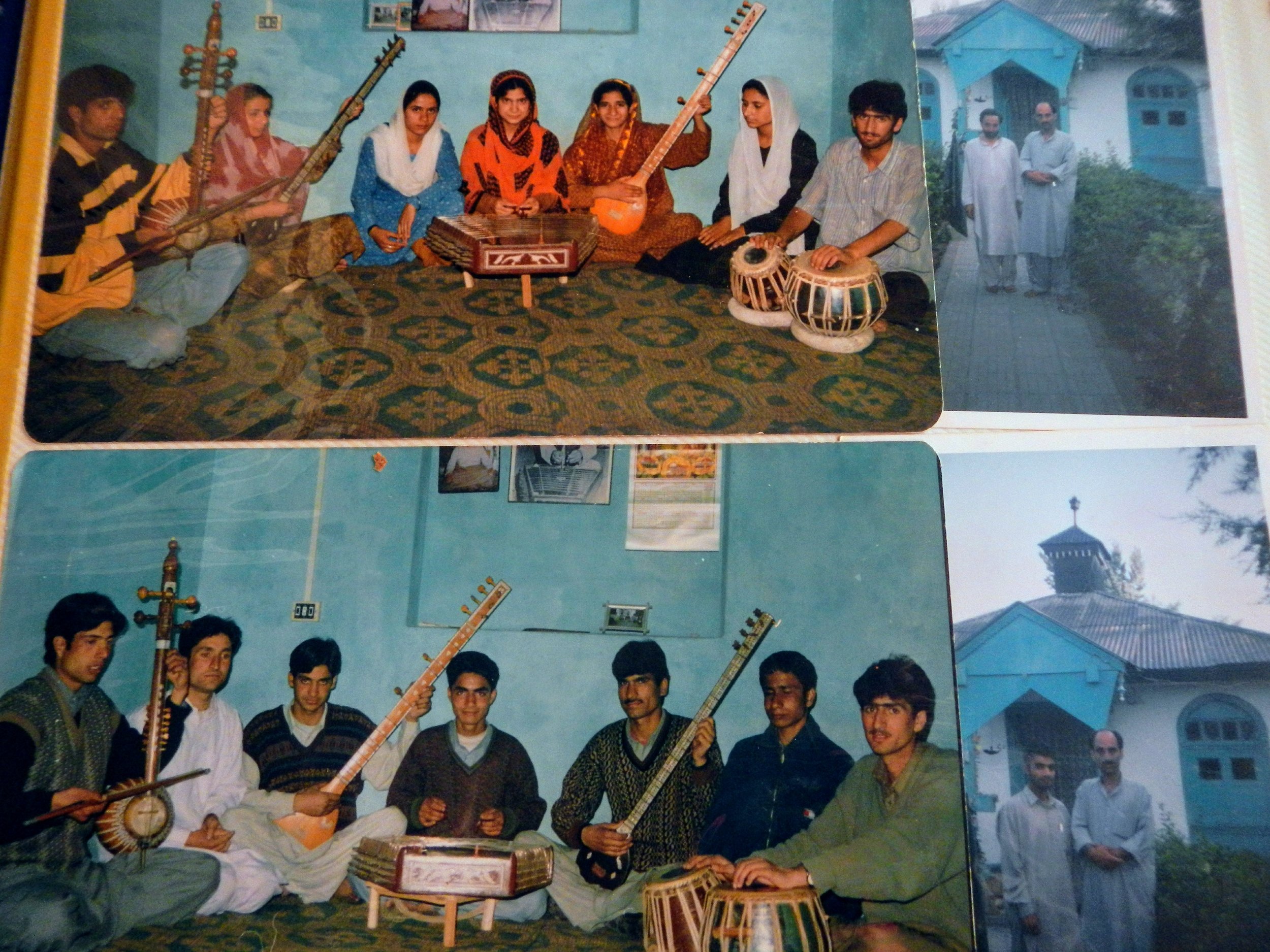 A photo album with students—girls and boys—who trained with Ustad Mohammad Yaqoob Sheikh in Kashmiri classical music in Srinagar, India. Photo by Priyadarshini Sen.