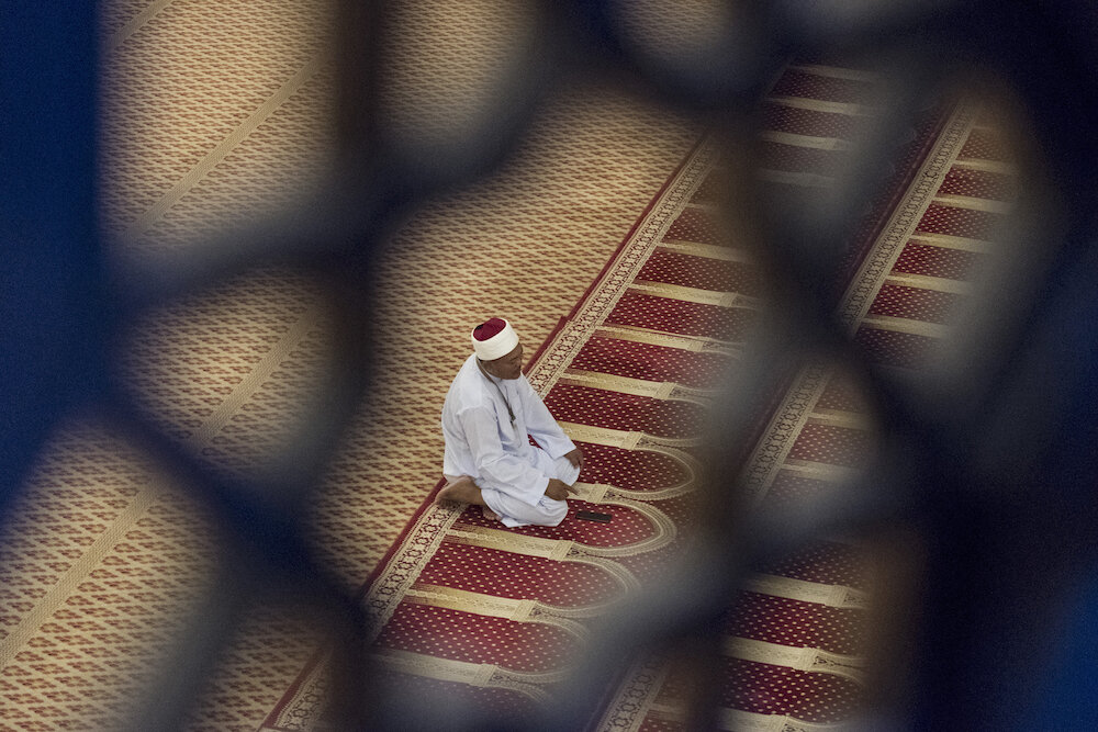  An imam performs Tarawih prayer on the first day of Ramadan at the National Mosque in Kuala Lumpur. The prayer was broadcasted live. Photo by Alexandra Radu. 