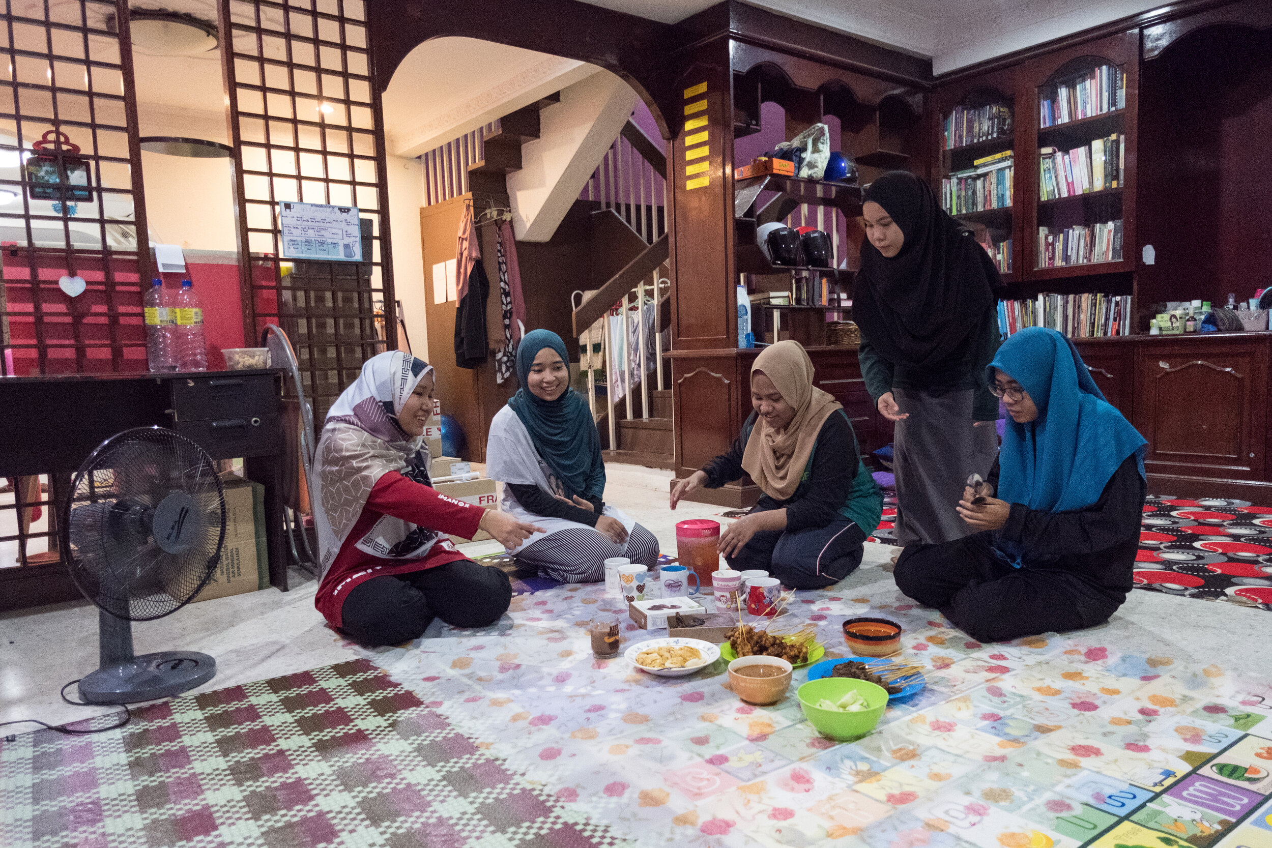  Housemates break fast together on the first day of Ramadan in Kuala Lumpur. It is their first Ramadan away from their families while Malaysia is under a Movement Control Order aimed at fighting against the COVID-19 pandemic. Photo by Alexandra Radu.