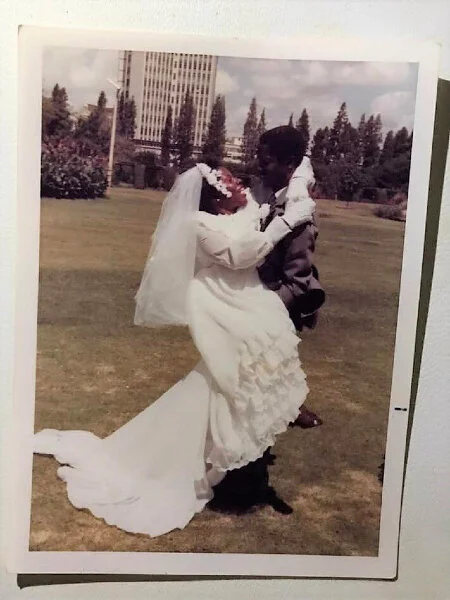 Kwedyo and her husband on their wedding day.