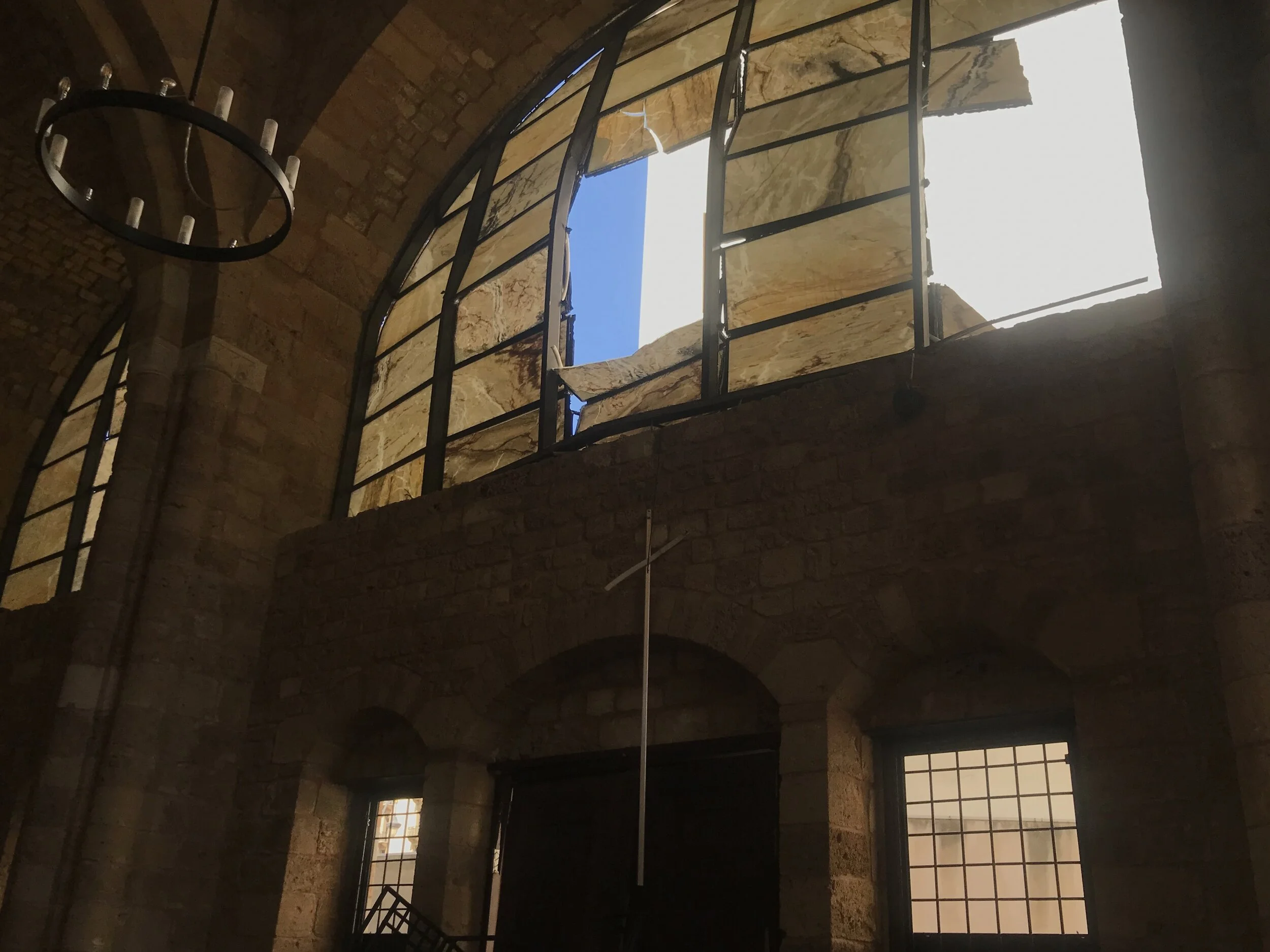 The church’s hanging cross was not damaged in the blast. Photo by Zainab Chamoun.