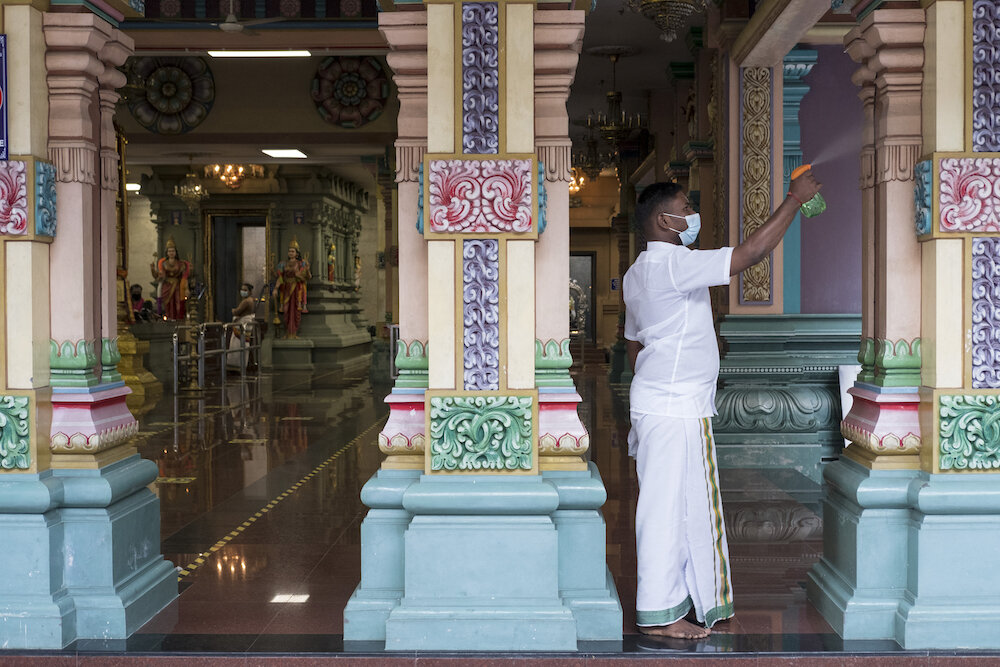  Sanitation was performed every 30 minutes during the Diwali prayers at the Sri Maha Mariammam Temple, the oldest Hindu temple in Kuala Lumpur. Photo by Alexandra Radu. 