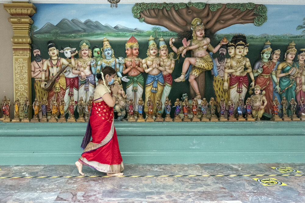  Hindus observed social distancing while praying on the morning of Diwali Nov. 14 at the Sri Maha Mariammam Temple. Photo by Alexandra Radu. 