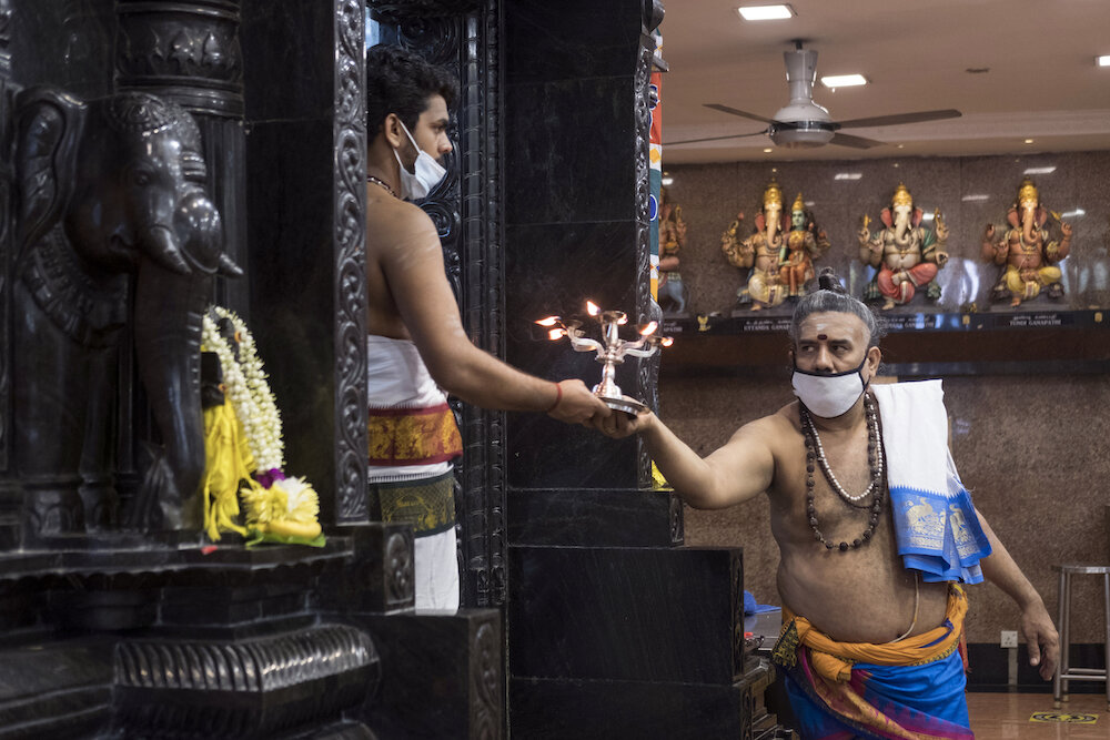  Hindu priests perform rituals on the morning of Diwali at the Court Hill Ganesh Temple, one of the oldest and most famous Hindu temples in Kuala Lumpur. Photo by Alexandra Radu. 
