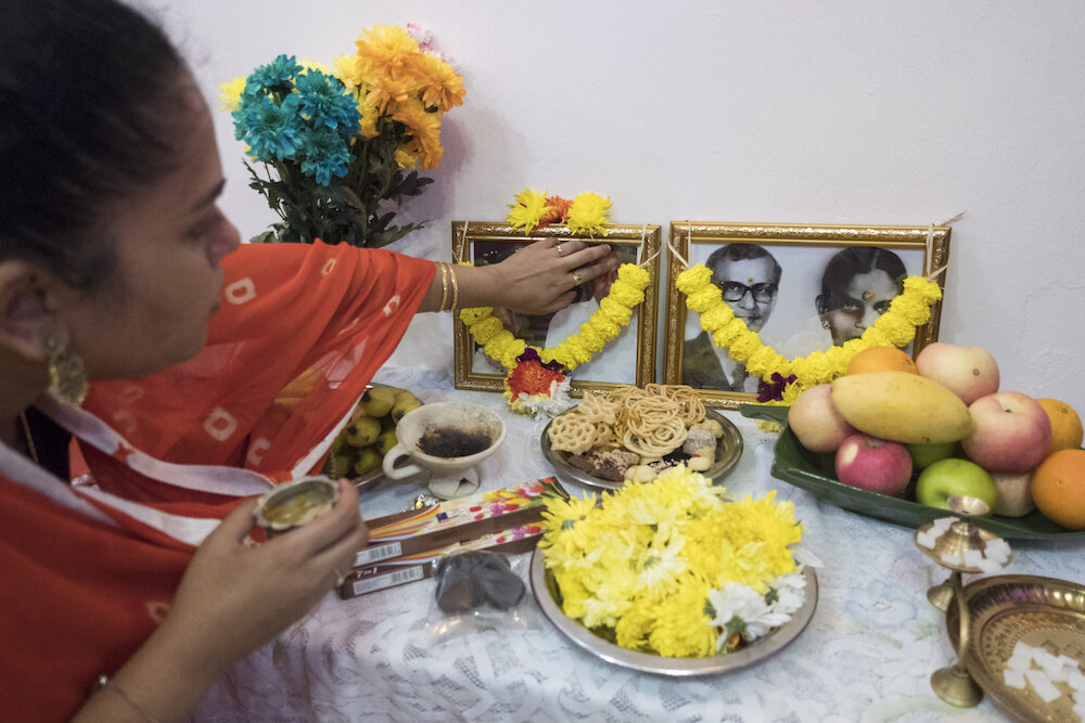  Kasthury gave offerings to her ancestors in her uncle’s house in Kuala Lumpur on Diwali. Photo by Alexandra Radu. 