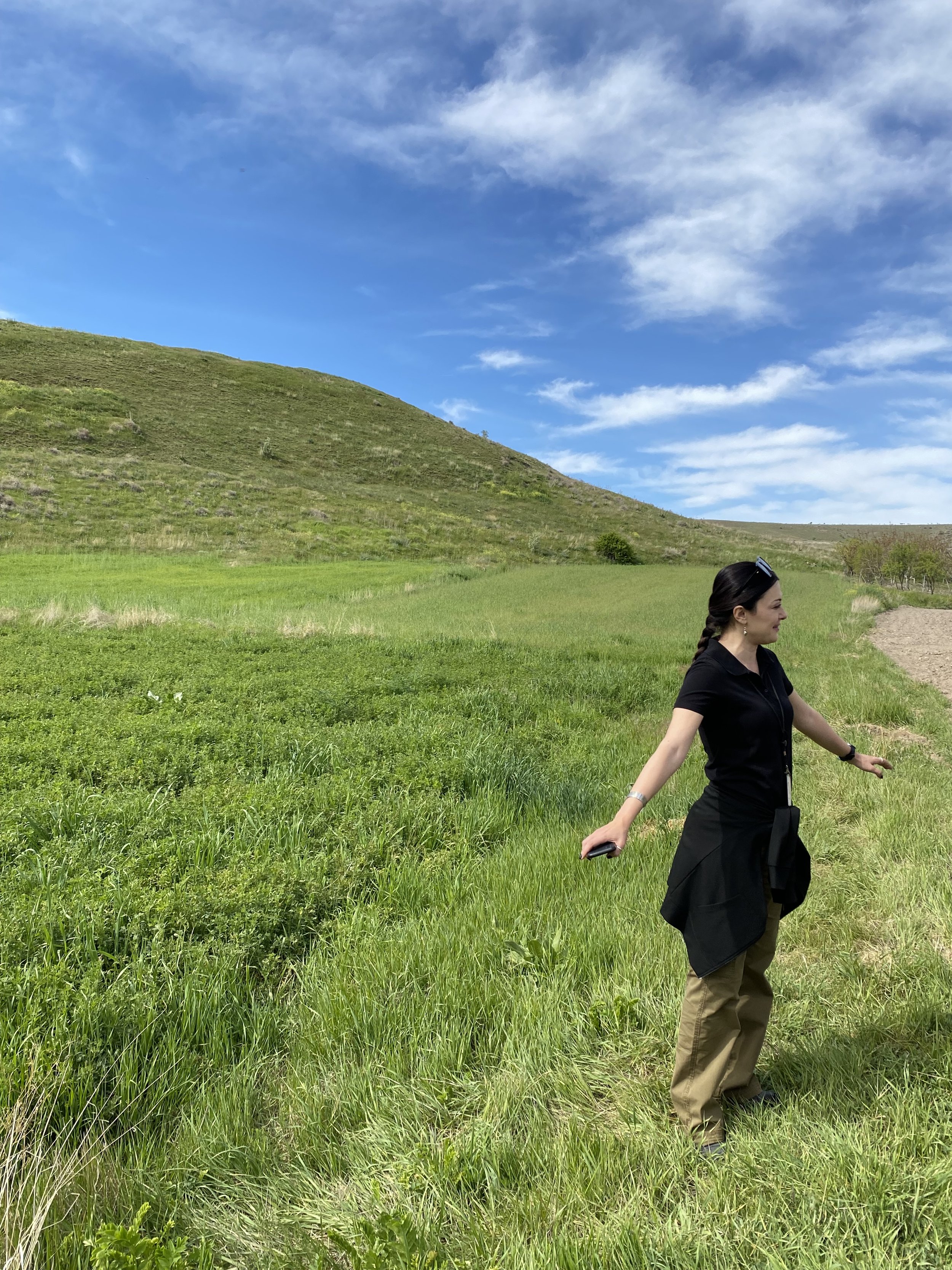 Arslan: Tour guide Damla Arslan describing the archeological tell, or mound, over the biblical town of Lystra.