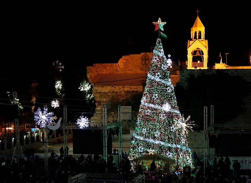 In First Celebration Since The Gaza War, Bethlehem’s Christmas Tree Shines Bright Again