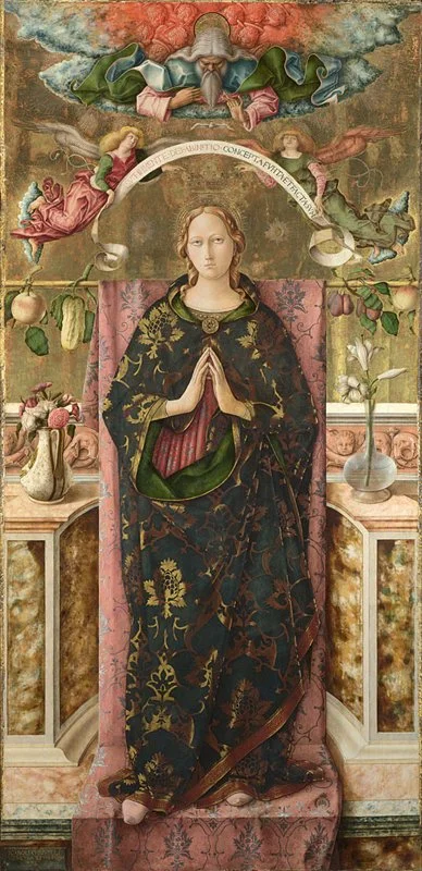 The virgin Mary in royal robes.