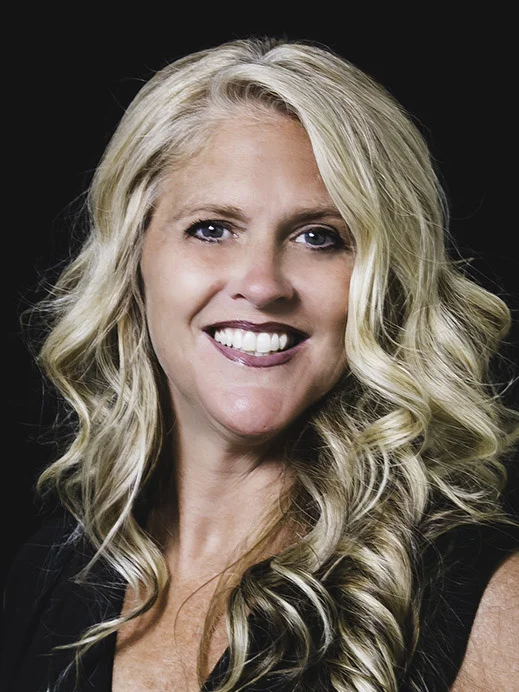 Kimberly has been a licensed cosmetologist for 28 years. As a former Miss New Jersey, she understands the importance of looking her best. Kimberly specializes in formal hairstyles and with her artistic vision and attention to detail enjoys working with clients to crate styles to suit their needs. She keeps up with the latest techniques and hair trends as they appear on the fashion scene. Kimberly continues to improve her skills in cutting and color with educators such as Bumble and Bumble , Matrix and Redken. She is certified with Coppola. Whether it is a cut, color, or formal hairstyle, the client will be pleased with the experience with Kimberly as well as the results. For the past eight years, Kim has been donating her time shaving heads for solidarity of children with cancer at an event called St. Baldricks. It's a project that helps raise money and awareness for children battling cancer.