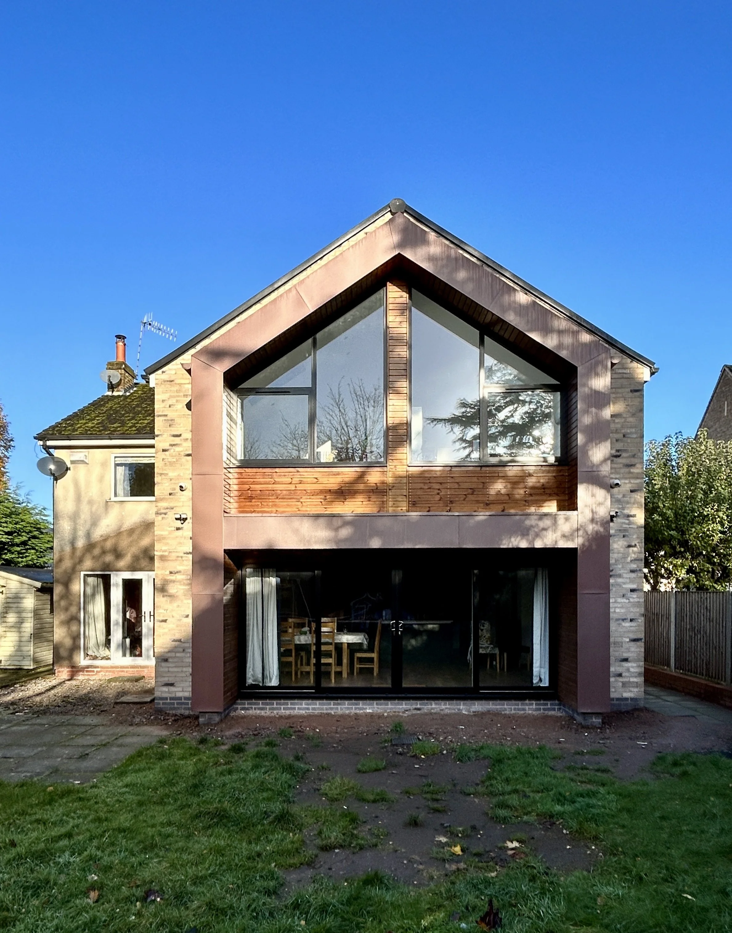 zinc and timber clad contemporary rear two storey home extension in Oldswinford, Stourbridge