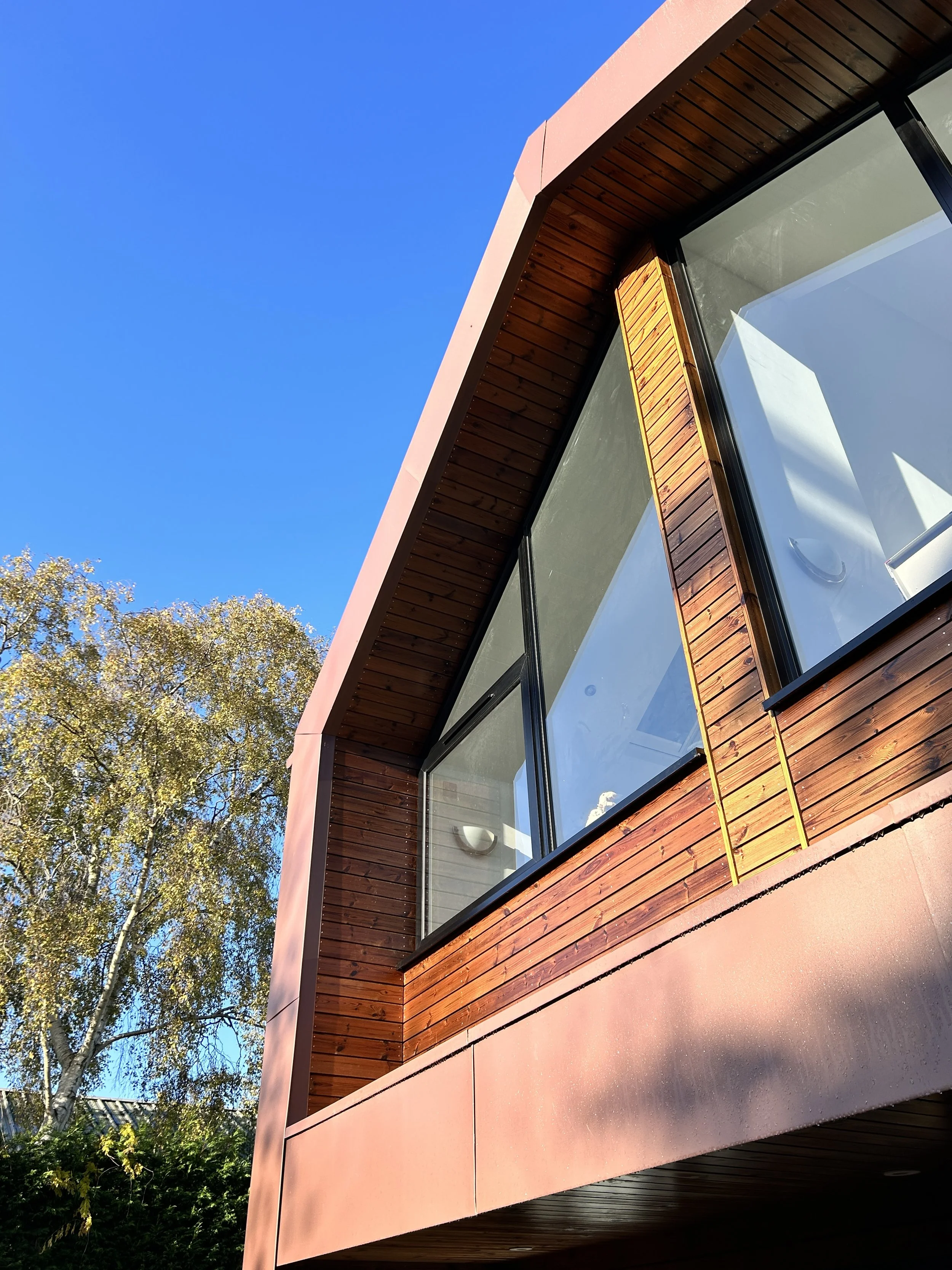 zinc and timber clad contemporary rear two storey home extension in Oldswinford, Stourbridge