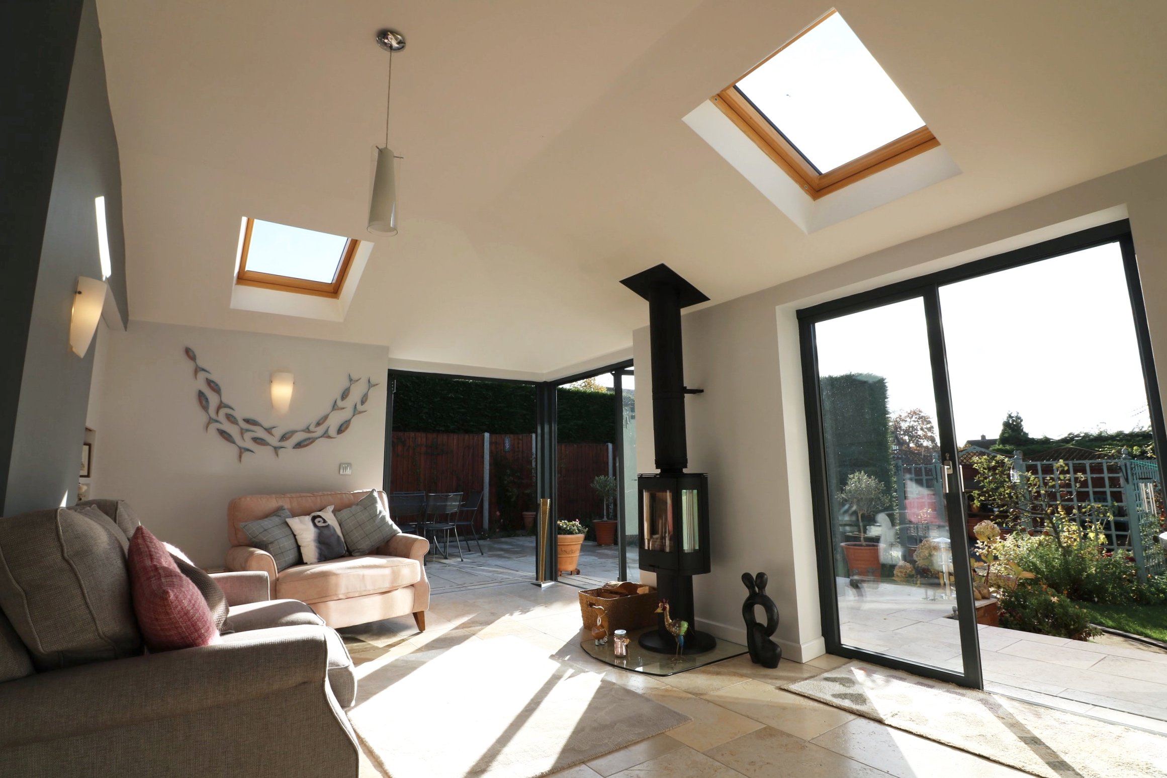 bespoke contemporary open plan garden room extension to property in Pedmore, Stourbridge. The extensions include corner to corner bi-fold doors, vaulted ceilings and a simple material palette o (Copy)
