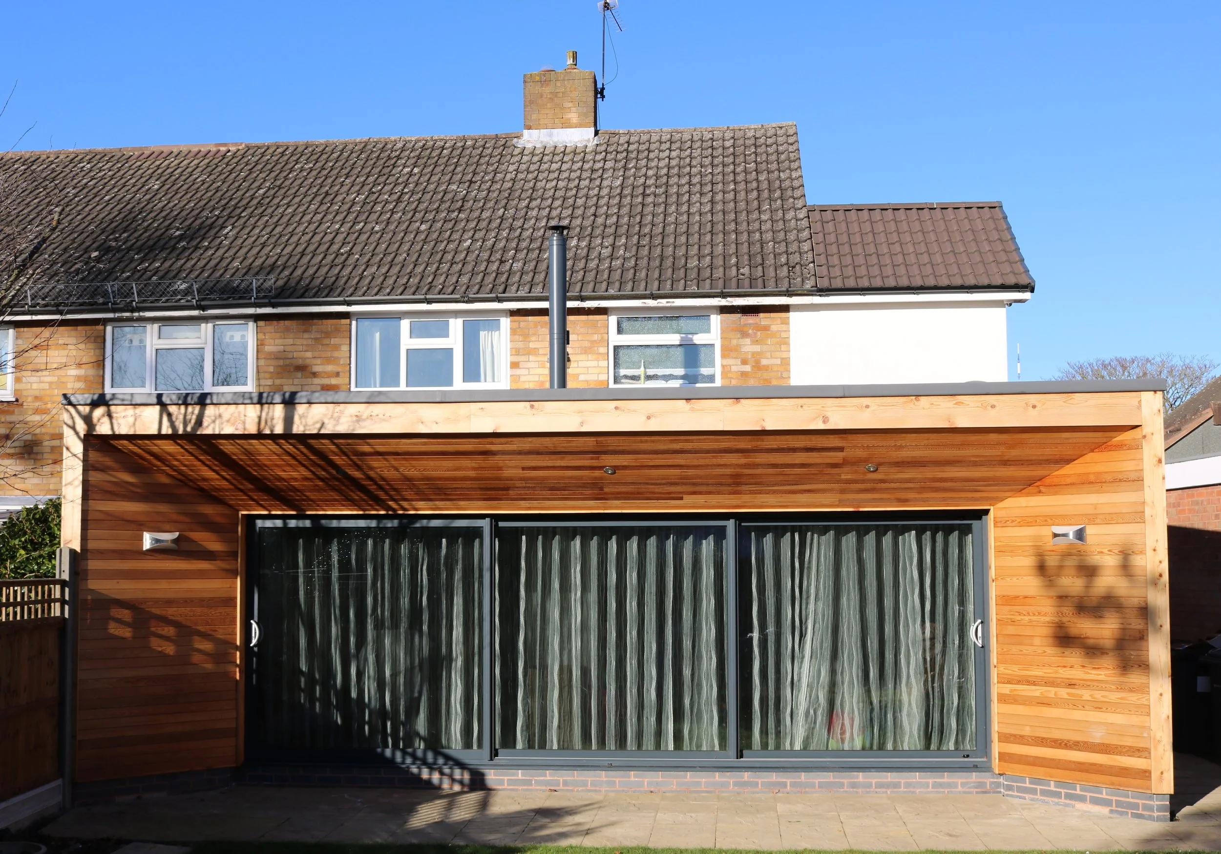 Contemporary cedar clad rear extension creating open plan family living space onto garden in Four Oaks, Sutton Coldfield (Copy) (Copy) (Copy) (Copy) (Copy)