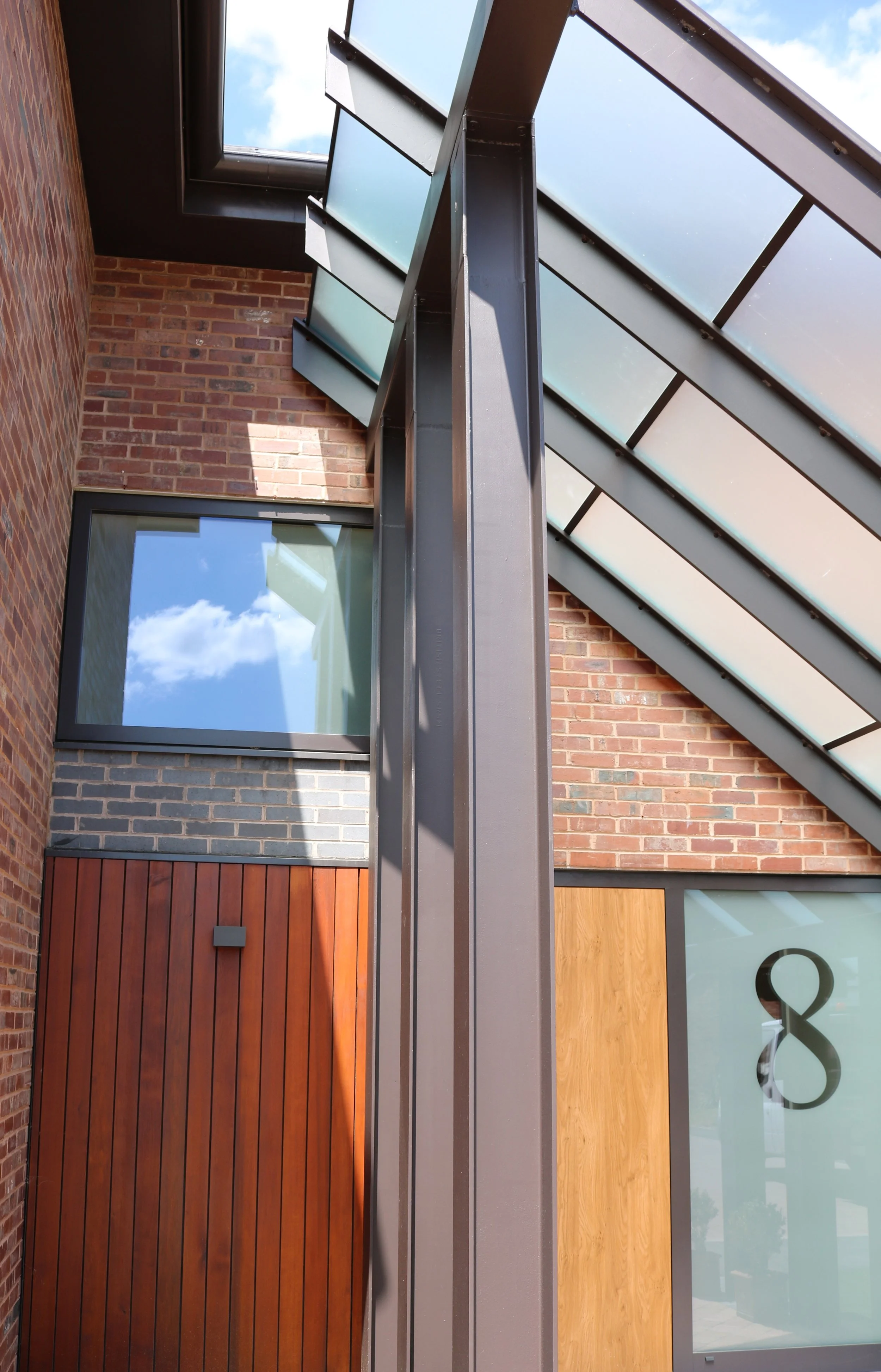 Bespoke contemporary 'one-off' new build family dwelling built to passivhaus principles in Hagley, near Stourbridge, Worcestershire. A modern covered glazed pergola entrance structure incorpora (Copy)