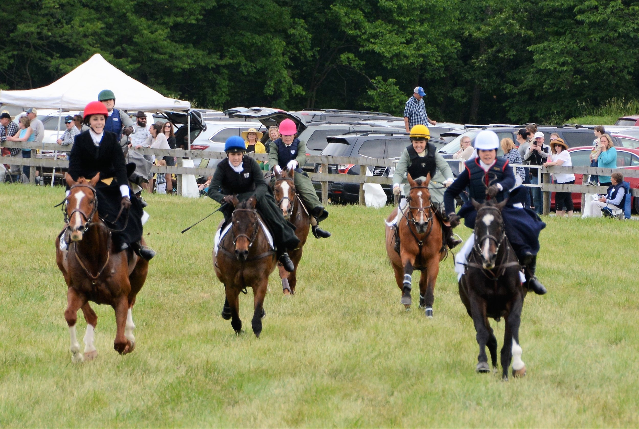 The top five horses were tightly bunched heading into the home stretch. From L to R: Reddington/Bernadette Boland, King of Hearts/Sarah Hansard, Easy to Say No/Aurora Munyan, The Gingerbread Man/Kathryn Cowles, In Todd We Trust/Devon Zebrovious. (c) Photo by Liz Callar