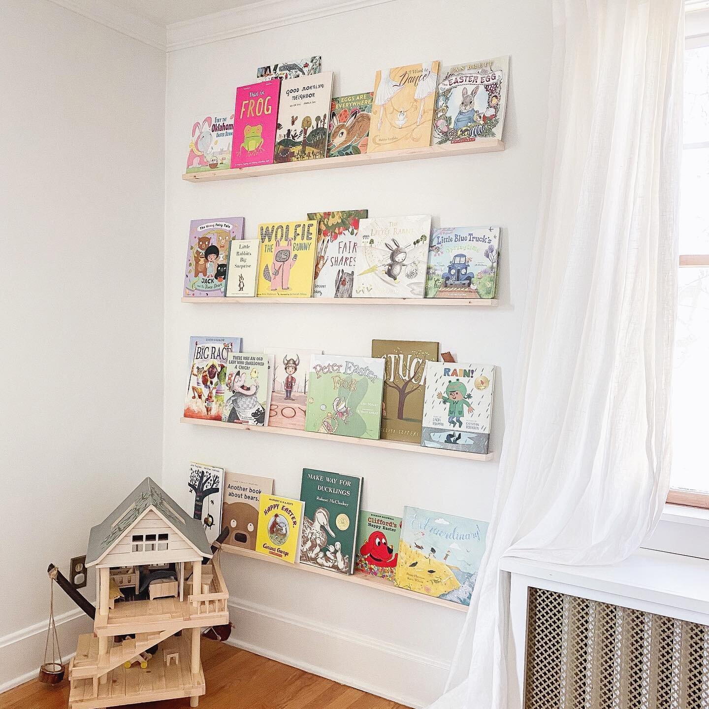 Easter book wall is up &amp; sprinkled with some springy reads in our best effort to will the cold away (its 18&deg; here today 🥶). I also posted a blog featuring Easter basket fillers for all ages (link in bio or my stories!), I cannot believe Marc