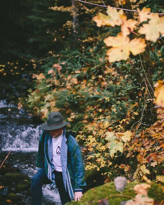 Kent exploring the Earth in our #EARTHGENDER tee because why not ... Shop Eternal this holiday season &mdash; and check out our expanding shop next week !! Just in time for the shopping season ✨✌🏻💚🌎
&mdash;&mdash;-
Hat @willandbear 
Indigo dyed fl
