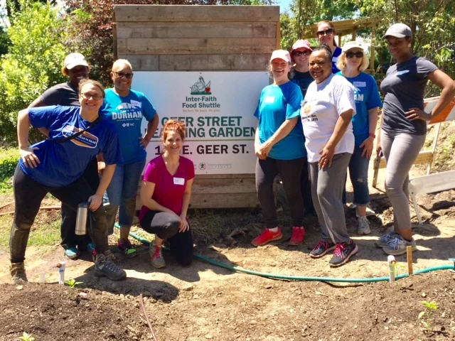 A group from Blue Cross Blue Shield NC volunteers at the Geer Street Learning Garden