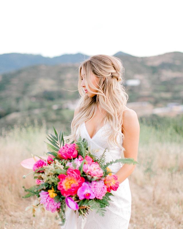 WOWZA 😍😍😍😍 Featured on @greenweddingshoes yesterday with some of the best ✨ | Photo @brooke_borough | Design @karen_marie_events | Florals @wildflowers_floraldesign | Venue @brookviewranch | Dress @bertabridal | Bridesmaid Dresses @showmeyourmumu